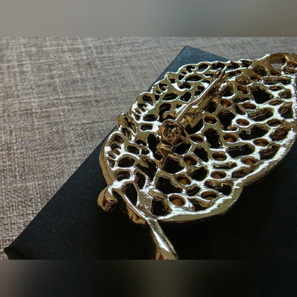 Vintage Gold Leaf Brooch With Light Blue Rhinestones.  Unsigned